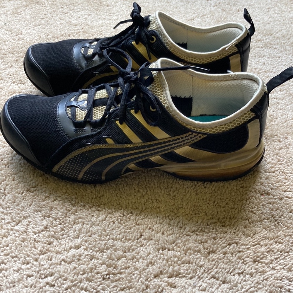 Black and Gold Puma Sneakers